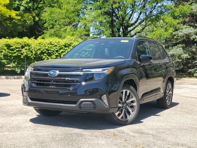 2026 Subaru FORESTER Touring in Crystal Black Silica — front three-quarter view