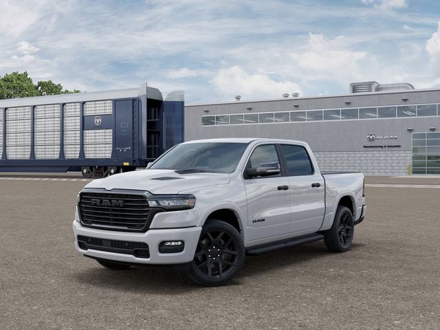 2026 RAM Ram 1500 RAM 1500 LARAMIE CREW CAB 4X4 5'7' BOX in Bright White Clear-Coat Exterior Paint — front three-quarter view