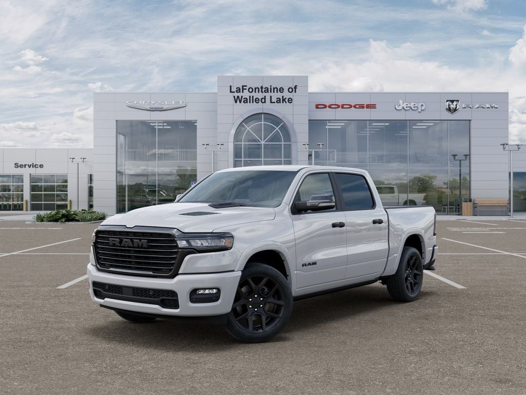 2026 RAM Ram 1500 RAM 1500 LARAMIE CREW CAB 4X4 5'7' BOX in Bright White Clear-Coat Exterior Paint — front three-quarter view