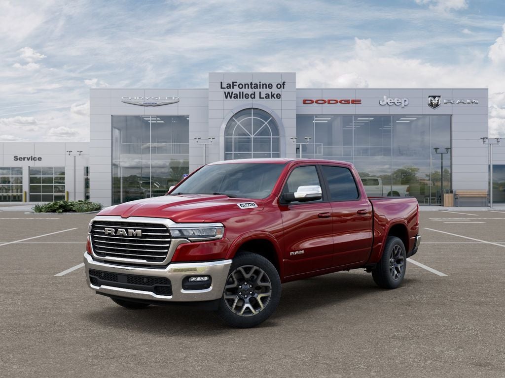2026 RAM Ram 1500 RAM 1500 LARAMIE CREW CAB 4X4 5'7' BOX in Molten Red Pearl-Coat Exterior Paint — front three-quarter view